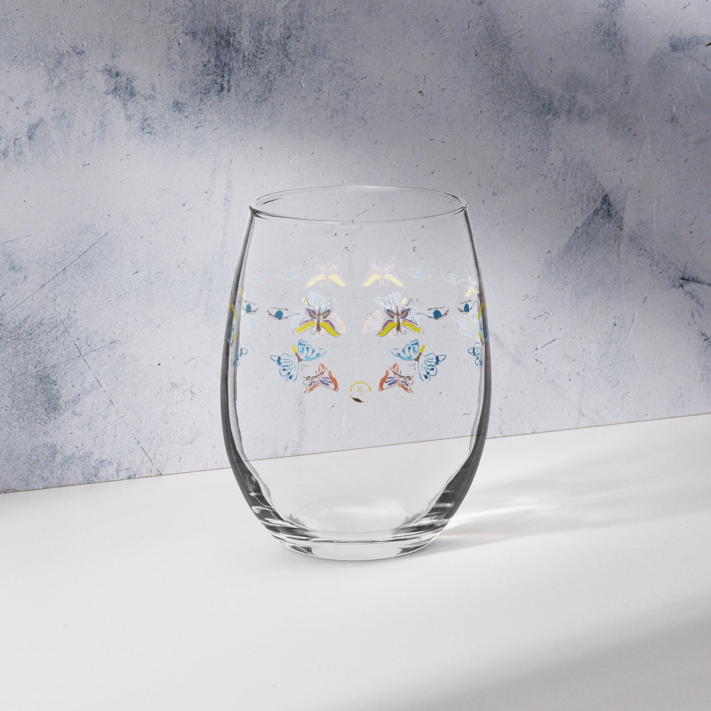 multi color butterfly blue eye artist design Stemless wine glass